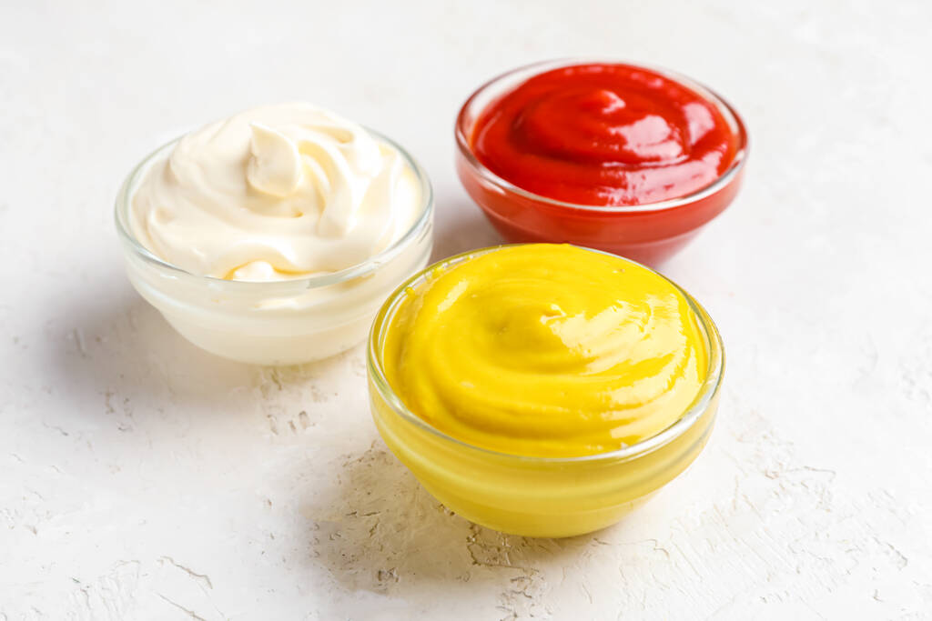 stock-photo-bowls-ketchup-mayonnaise-mustard-white-grunge-table?token=
